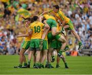 20 July 2014; The Donegal players celebrate at the final whistle. Electric Ireland Ulster GAA Football Minor Championship Final, Armagh v Donegal, St Tiernach's Park, Clones, Co. Monaghan. Picture credit: Oliver McVeigh / SPORTSFILE