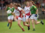 20 July 2014; Ciara Whyte, Mayo, in action against Kate Maher, Kerry. All-Ireland U14 'A' Ladies Football Championship Final, Kerry v Mayo, MacDonagh Park, Nenagh, Co. Tipperary. Picture credit: Matt Browne / SPORTSFILE