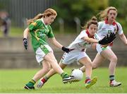 20 July 2014; Kate Maher of Kerry in action against Amy O'Connor of Mayo during the All-Ireland U14 'A' Ladies Football Championship Final match between Kerry and Mayo at MacDonagh Park in Nenagh, Tipperary. Photo by Matt Browne/Sportsfile
