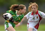 20 July 2014; Anna O'Reilly, Kerry, in action against Carrie Loftus, Mayo. All-Ireland U14 'A' Ladies Football Championship Final, Kerry v Mayo, MacDonagh Park, Nenagh, Co. Tipperary. Picture credit: Matt Browne / SPORTSFILE