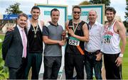 20 July 2014; Brian Gregan, 521, Clonliffe Harriers AC, Dublin, is presented with the Jim McKee Perpetual Trophy for winning the Men's 400m by former Irish 400m Champion and grandson of Jim McKee, Paul McKee in the company of, from left, Ciarán Ó Catháin, President, Athletics Ireland, silver medallist Craig Lynch, Shercock AC, Cavan, Jim Dowdall, CEO, GloHealth, and bronze medallist Brian Murphy, Crusaders AC, Dublin. GloHealth Senior Track and Field Championships, Morton Stadium, Santry, Co. Dublin. Picture credit: Brendan Moran / SPORTSFILE