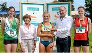 20 July 2014; Jim Dowdall, CEO, GloHealth, right, presents the gold medal for the Women's 100m Hurdles to Sarah Lavin, UCD AC, Dublin, in the company of silver medallist Shannen Dawkins, left, St Joseph's AC, Kilkenny, bronze medallist Naomi Morgan, City of Derry AC Spartans AC, and Maeve Kyle. GloHealth Senior Track and Field Championships, Morton Stadium, Santry, Co. Dublin. Picture credit: Brendan Moran / SPORTSFILE