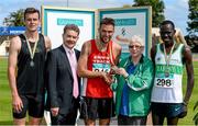 20 July 2014; Aine Pobjoy, Life Vice President, Athletics Ireland, right, presents the gold medal for the Men's 3000m Steeplechase to Rory Chesser, Ennis Track AC, Clare, in the company of silver medallist Tomas Cotter, left, Dunleer AC, Louth, bronze medallist Freddy Keron Situk, Raheny Shamrocks AC, Dublin, and Ciarán Ó Catháin, President, Athletics Ireland. GloHealth Senior Track and Field Championships, Morton Stadium, Santry, Co. Dublin. Picture credit: Brendan Moran / SPORTSFILE