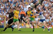 20 July 2014; Odhran MacNiallais, Donega, in action against Darren Hughes, Monaghan. Ulster GAA Football Senior Championship Final, Donegal v Monaghan, St Tiernach's Park, Clones, Co. Monaghan. Picture credit: Oliver McVeigh / SPORTSFILE