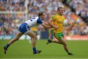 20 July 2014; Neil McGee, Donegal, in action against Paul Finlay, Monaghan. Ulster GAA Football Senior Championship Final, Donegal v Monaghan, St Tiernach's Park, Clones, Co. Monaghan. Picture credit: Oliver McVeigh / SPORTSFILE