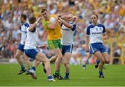 20 July 2014; Leo McLoone, Donegal, in action against Fintan Kelly and Colin Walshe, Monaghan. Ulster GAA Football Senior Championship Final, Donegal v Monaghan, St Tiernach's Park, Clones, Co. Monaghan. Picture credit: Oliver McVeigh / SPORTSFILE