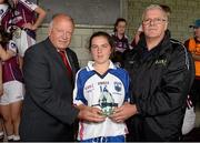 20 July 2014; Pat Quill, President of the LGFA, and Liam Costigan, President, Connacht Ladies Football, present the player of the match trophy to Kaiesha Tobin of Waterford. All-Ireland U14 'B' Ladies Football Championship Final, Galway v Waterford, MacDonagh Park, Nenagh, Co. Tipperary. Picture credit: Matt Browne / SPORTSFILE
