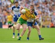 20 July 2014; Christy Toye, Donegal, in action against Dermot Malone, Monaghan. Ulster GAA Football Senior Championship Final, Donegal v Monaghan, St Tiernach's Park, Clones, Co. Monaghan. Picture credit: Oliver McVeigh / SPORTSFILE