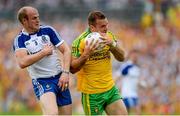 20 July 2014; Neil McGee, Donegal, in action against Dick Clerkin, Monaghan. Ulster GAA Football Senior Championship Final, Donegal v Monaghan, St Tiernach's Park, Clones, Co. Monaghan. Picture credit: Oliver McVeigh / SPORTSFILE