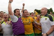20 July 2014; Donegal's Michael Murphy, right, celebrates with John Duffy, selector, after the final whistle. Ulster GAA Football Senior Championship Final, Donegal v Monaghan, St Tiernach's Park, Clones, Co. Monaghan. Picture credit: Oliver McVeigh / SPORTSFILE