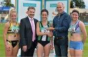 20 July 2014; Jim Dowdall, CEO, GloHealth, right, presents the gold medal for the Women's 400m Hurdles to Christine McMahon, Ballymena & Antrim AC, Antrim, in the company of silver medallist Jess Neville, left, Leevale AC, Cork, bronze medallist Grace O'Rourke, Dundrum South Dublin AC, Dublin, and Ciarán Ó Catháin, President, Athletics Ireland. GloHealth Senior Track and Field Championships, Morton Stadium, Santry, Co. Dublin. Picture credit: Brendan Moran / SPORTSFILE