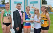 20 July 2014; Amy Rowe, Marketing Manager, GloHealth, right, presents the gold medal for the Women's 800m to Katie Kirk, Queen's University, Antrim, in the company of silver medallist Roseanne Galligan, left, Newbridge AC< Kildare, bronze medallist Louise Shanahan, Leevale AC, Cork and Ciarán Ó Catháin, President, Athletics Ireland. GloHealth Senior Track and Field Championships, Morton Stadium, Santry, Co. Dublin. Picture credit: Brendan Moran / SPORTSFILE