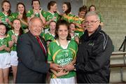 20 July 2014; Pat Quill, President of the LGFA, and Liam Costigan, President, Connacht Ladies Football, present the player of the match trophy to Kerry's Fiadhna Tangney. All-Ireland U14 'A' Ladies Football Championship Final, Kerry v Mayo, MacDonagh Park, Nenagh, Co. Tipperary. Picture credit: Matt Browne / SPORTSFILE