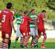 21 July 2014; Gary Buckley, right, Cork City, clashes with Ronan Finn, second from right, Shamrock Rovers, shortly before been sent off by referee Paul Tuite. EA Sports Cup, Quarter-Final, Shamrock Rovers v Cork City, Tallaght Stadium, Tallaght, Co. Dublin. Picture credit: David Maher / SPORTSFILE