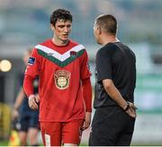 21 July 2014; John Dunleavy, Cork City, walks past Shamrock Rovers manager Trevor Croly after been substituted due to an injury. EA Sports Cup, Quarter-Final, Shamrock Rovers v Cork City, Tallaght Stadium, Tallaght, Co. Dublin. Picture credit: David Maher / SPORTSFILE