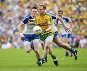 20 July 2014; Anthony Thompson, Donegal, in action against Conor McManus, Monaghan. Ulster GAA Football Senior Championship Final, Donegal v Monaghan, St Tiernach's Park, Clones, Co. Monaghan. Picture credit: Oliver McVeigh / SPORTSFILE
