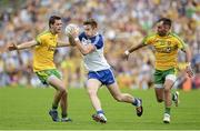 20 July 2014; Fintan Kelly, Monaghan, in action against Odhran MacNiallais and Karl Lacey, Donegal. Ulster GAA Football Senior Championship Final, Donegal v Monaghan, St Tiernach's Park, Clones, Co. Monaghan. Picture credit: Oliver McVeigh / SPORTSFILE