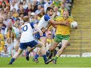 20 July 2014; Colm McFadden, Donegal, in action against Paudie McKenna and Drew Wylie, Monaghan. Ulster GAA Football Senior Championship Final, Donegal v Monaghan, St Tiernach's Park, Clones, Co. Monaghan. Picture credit: Oliver McVeigh / SPORTSFILE