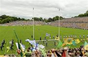 20 July 2014; The Donegal and Monaghan teams on parade. Ulster GAA Football Senior Championship Final, Donegal v Monaghan, St Tiernach's Park, Clones, Co. Monaghan. Picture credit: Oliver McVeigh / SPORTSFILE