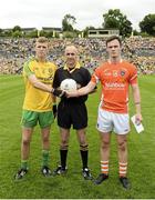 20 July 2014; Referee Ronan Barry along with Donegal captain Niall Harley, left, and Armagh Captain Caolan McConville. Electric Ireland Ulster GAA Football Minor Championship Final, Armagh v Donegal, St Tiernach's Park, Clones, Co. Monaghan. Picture credit: Oliver McVeigh / SPORTSFILE
