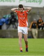 20 July 2014; A dejected Conor McNicholl, Armagh at the final whistle. Electric Ireland Ulster GAA Football Minor Championship Final, Armagh v Donegal, St Tiernach's Park, Clones, Co. Monaghan. Picture credit: Oliver McVeigh / SPORTSFILE