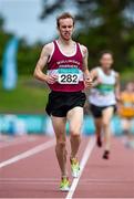 20 July 2014; Mark Christie, Mullingar Shamrocks AC, Westmeath, crosses the line to finish in second place in the Men's 5000m Final. GloHealth Senior Track and Field Championships, Morton Stadium, Santry, Co. Dublin. Picture credit: Brendan Moran / SPORTSFILE