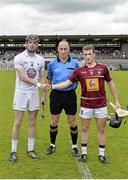 14 June 2014; Captains Niall Ó Muineacháin, left, Kildare, and Eoin Price, Westmeath, shake hands in the company of Referee John Keenan ahead of the game. GAA All-Ireland Hurling Senior Championship Promotion Play Off, Westmeath v Kildare, Cusack Park, Mullingar, Co. Westmeath. Picture credit: Piaras Ó Mídheach / SPORTSFILE