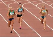 19 July 2014; Kelly Proper, left, Ferrybank A.C, Waterford, leads Steffi Creaner, centre, Dublin City Harriers A.C, and Sarah Lavin, UCD A.C, on her way to winning the Women's 200m Final.  GloHealth Senior Track and Field Championships, Morton Stadium, Santry, Co. Dublin. Picture credit: Piaras Ó Mídheach / SPORTSFILE