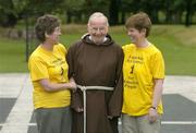 27 August 2006; Joan McNevin, left, and Paddy Pender with Br. Kevin Crowley at the final training session before they head for the highways to walk from Monaghan to Dublin. The aim of the walk is to raise awareness about the issue of homelessness and they will be relying on the public to offer food, water and shelter, the girls will be homeless for the duration of their walk. Please take care driving between Monaghan, Castleblayney, Carrickmacross, Ardee, Navan, Clonee and Dublin between the 2nd of September and 6th September. The Capuchin Day Centre, run by the Irish Franciscan Capuchins, provides hot meals for up to 300 people a day. Picture credit; Damien Eagers / SPORTSFILE