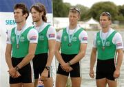 27 August 2006; Ireland rowers, from left, Gearoid Towey, bow, Eugene Coakley, second seat, Richard Archibald, third seat and Paul Griffin, stroke, stand for the national anthem of World Champions China, after finishing third and winning a bronze medal during the lightwight men's four A Final, 2006 World Rowing Championships, Dorney Lake, Eton, England. Picture credit; David Maher / SPORTSFILE