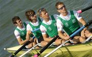27 August 2006; Ireland rowers, from left, Gearoid Towey, bow, Eugene Coakley, second seat, Richard Archibald, third seat and Paul Griffin, stroke, row back to their pontoon after finishing third and winning a bronze medal during the lightwight men's four A Final, 2006 World Rowing Championships, Dorney Lake, Eton, England. Picture credit; David Maher / SPORTSFILE