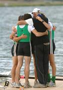 27 August 2006; Ireland rowers Gearoid Towey, Eugene Coakley, Richard Archibald, and Paul Griffin,huddle together with their head coach, Harald Jahrling after finishing third and winning a bronze medal during the lightwight men's four A Final. 2006 World Rowing Championships, Dorney Lake, Eton, England. Picture credit; David Maher / SPORTSFILE