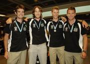 28 August 2006; Ireland Rowers, from left, Gearoid Towey, Eugene Coakley, Richard Archibald and Paul Griffin who won bronze in the lightweight men's four A Final at the 2006 World Rowing Championships on their arrival home to Dublin Airport, Dublin. Picture credit; David Maher / SPORTSFILE