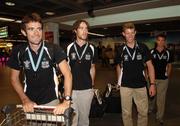 28 August 2006; Ireland Rowers, from left, Gearoid Towey, Eugene Coakley, Richard Archibald and Paul Griffin who won bronze in the lightweight men's four A Final at the 2006 World Rowing Championships on their arrival home to Dublin Airport, Dublin. Picture credit; David Maher / SPORTSFILE