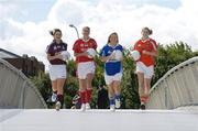 29 August 2006; From left, Galway captain Lorna Joyce, Cork captain Juliet Murphy, Laois captain Gemma O'Connor, and Armagh captain Bronagh O'Donnell run across the Sean O'Casey bridge ahead of their meeting in the TG4 All-Ireland Senior Ladies Football Championship semi-final in Roscommon and Tullamore on Saturday, September 2nd and 9th. IFSC, Dublin. Picture credit; Damien Eagers / SPORTSFILE