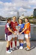29 August 2006; From left are Galway captain Lorna Joyce, Cork captain Juliet Murphy, Laois captain Gemma O'Connor, and Armagh captain Bronagh O'Donnell at the Sean O'Casey bridge ahead of their meeting in the TG4 All-Ireland Senior Ladies Football Championship semi-final in Roscommon and Tullamore on Saturday, September 2nd and 9th. IFSC, Dublin. Picture credit; Damien Eagers / SPORTSFILE