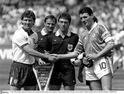 12 June 1988; Team captains Bryan Robson of England, left, and Frank Stapleton of Republic of Ireland shake hands and exchange pennants prior to the UEFA European Football Championship Finals Group B match between England and Republic of Ireland at Neckarstadion in Stuttgart, Germany. Photo by Ray McManus/Sportsfile