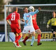 31 August 2006; Kevin Kelbie, Ballymena United, in action against Jamie Marks and John Convery, Portadown. CIS Insurance Cup, Ballymena United v Portadown, Ballymena Showgrounds, Ballymena, Co. Antrim. Picture credit: Oliver McVeigh / SPORTSFILE