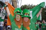 2 September 2006; Republic of Ireland supporters Jamie McCann, left, and Niall Geoghegan, both from Dublin, cheer on their team before the start of the game. Euro 2008 Championship Qualifier, Germany  v Republic of Ireland, Gottleib-Damlier Stadion, Stuttgart, Germany. Picture credit: David Maher / SPORTSFILE
