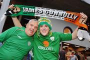 2 September 2006; Republic of Ireland supporters Mick Pender, left and his son Dave, from Dublin, cheer on their team before the start of the game. Euro 2008 Championship Qualifier, Germany  v Republic of Ireland, Gottleib-Damlier Stadion, Stuttgart, Germany. Picture credit: David Maher / SPORTSFILE
