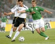 2 September 2006; Kevin Doyle, Republic of Ireland, in action against Manuel Friedrich, Germany. Euro 2008 Championship Qualifier, Germany  v Republic of Ireland, Gottleib-Damlier Stadion, Stuttgart, Germany. Picture credit: Brian Lawless / SPORTSFILE