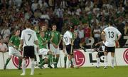 2 September 2006; The Republic of Ireland wall, left to right, Andy O'Brien, Steven Reid, Stephen Carr, Kevin Kilbane and John O'Shea, fail to block the free kick of Germany's Lukas Podolski for Germany's first goal. Euro 2008 Championship Qualifier, Germany  v Republic of Ireland, Gottleib-Damlier Stadion, Stuttgart, Germany. Picture credit: Brian Lawless / SPORTSFILE