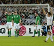 2 September 2006; Dejected Republic of Ireland players, left to right, Kevin Kilbane, John O'Shea, Steve Finnan and Shay Given, look on after Lukas Podolski, Germany, had scored his side's first goal. Euro 2008 Championship Qualifier, Germany  v Republic of Ireland, Gottleib-Damlier Stadion, Stuttgart, Germany. Picture credit: David Maher / SPORTSFILE