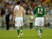 2 September 2006; Robbie Keane, left, and Stephen Elliott, Republic of Ireland, at the end of the game. Euro 2008 Championship Qualifier, Germany  v Republic of Ireland, Gottleib-Damlier Stadion, Stuttgart, Germany. Picture credit: David Maher / SPORTSFILE
