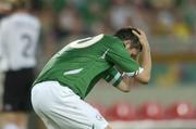 2 September 2006; Robbie Keane, Republic of Ireland, holds his head after his shot goes wide of the post. Euro 2008 Championship Qualifier, Germany v Republic of Ireland, Gottleib-Damlier Stadion, Stuttgart, Germany. Picture credit: David Maher / SPORTSFILE