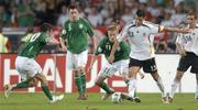 2 September 2006; Michael Ballack, Germany, in action against Robbie Keane, left, Steve Finnan, and Damien Duff, Republic of Ireland. Euro 2008 Championship Qualifier, Germany v Republic of Ireland, Gottleib-Damlier Stadion, Stuttgart, Germany. Picture credit: Brian Lawless / SPORTSFILE