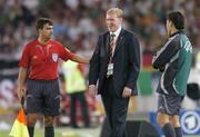 2 September 2006; Republic of Ireland manager Steve Staunton is approached by a referees assistant in the first half. Euro 2008 Championship Qualifier, Germany  v Republic of Ireland, Gottleib-Damlier Stadion, Stuttgart, Germany. Picture credit: Brian Lawless / SPORTSFILE