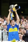 3 September 2006; The Tipperary captain Joey McLoughney lifts the Irish Press Cup. ESB All-Ireland Minor Hurling Championship Final, Galway v Tipperary, Croke Park, Dublin. Picture credit: Pat Murphy / SPORTSFILE