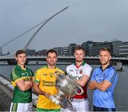 23 July 2014; In attendance at the launch of 2014 GAA Football Championship All-Ireland Series are, from left, James O'Donoghue, Kerry, Karl Lacey, Donegal, Robert Hennelly, Mayo, and Jonny Cooper, Dublin, with the Sam Maguire Cup. Sir John Rogerson's Quay, Dublin Picture credit: Brendan Moran / SPORTSFILE