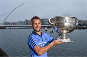 23 July 2014; In attendance at the launch of 2014 GAA Football Championship All-Ireland Series is Jonny Cooper, Dublin, with the Sam Maguire Cup. Sir John Rogerson's Quay, Dublin Picture credit: Brendan Moran / SPORTSFILE